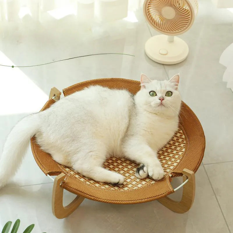 Brown woven rattan pet hammock bed measuring 46cm square with 17.5cm height