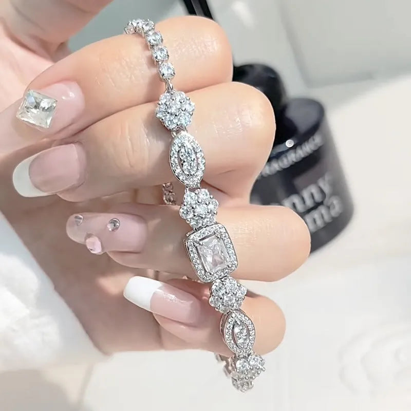 Women's sterling silver-plated bracelet with zircon stones in geometry design, shown in two size options