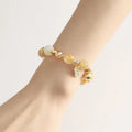 Gold-coloured rutilated quartz bracelet with Korean style design and electroplated crystal construction