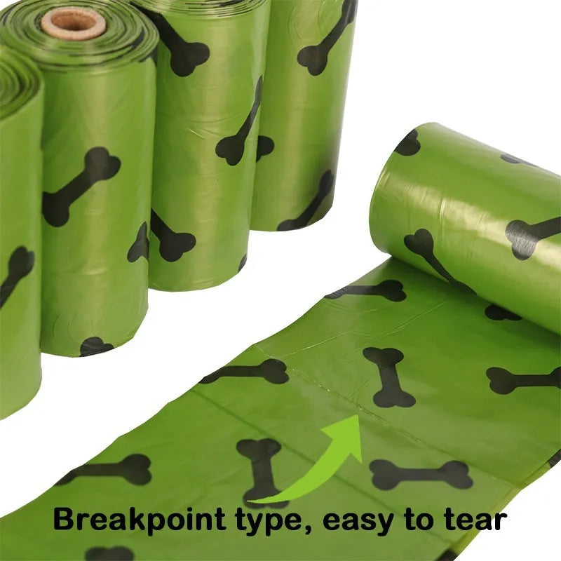 Roll of army green degradable dog poop bags with black bone print, showing bag size of 23x33cm.