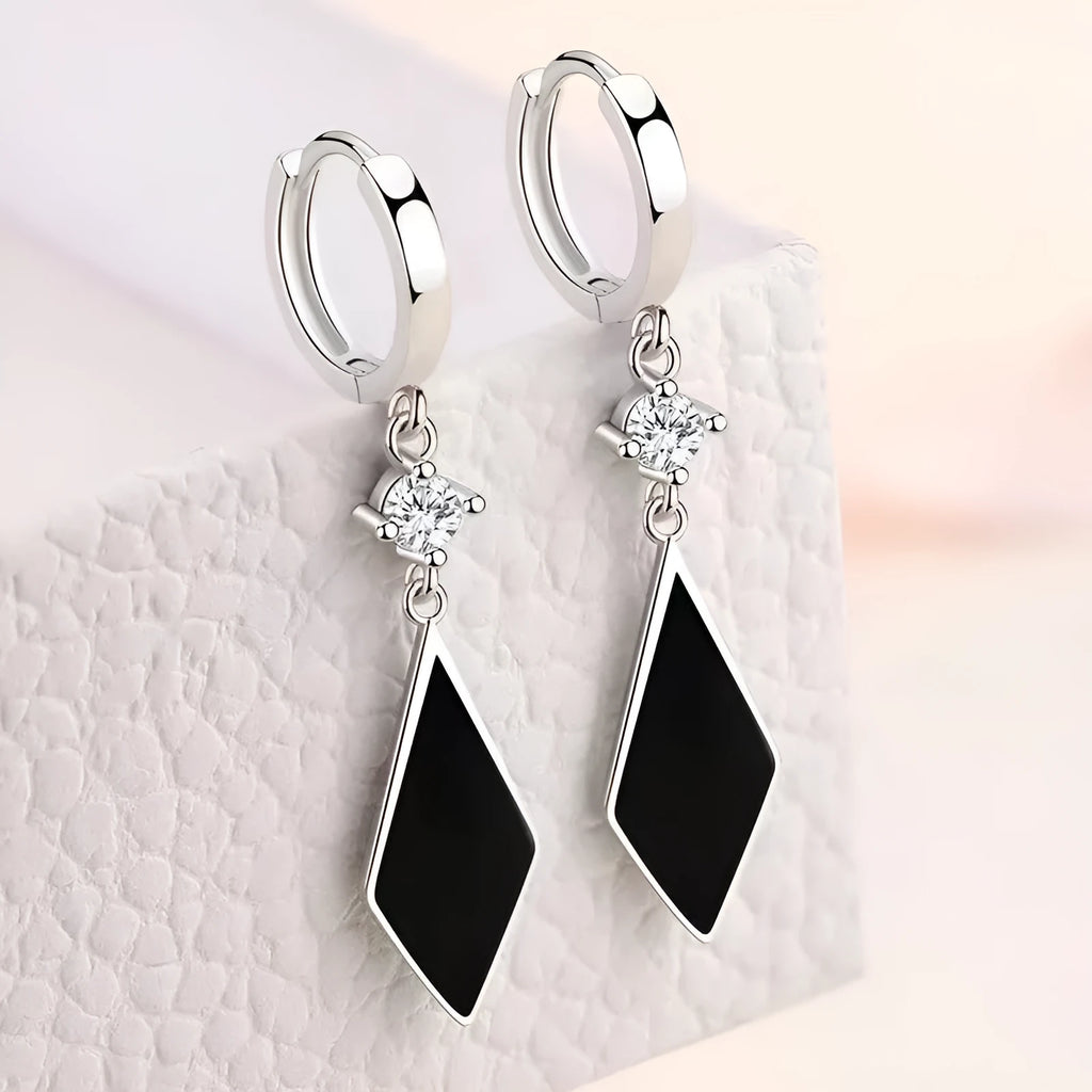 Silver geometric diamond clip earrings with 0.3 cm measurement and electroplated zinc alloy construction