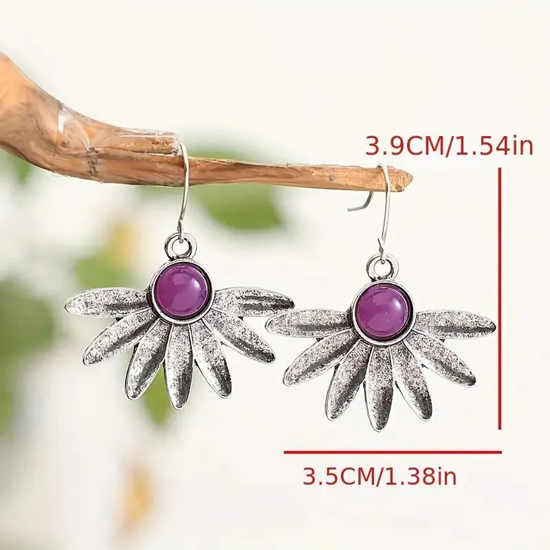 Purple bohemian earrings with animal zodiac modelling and resin gemstone accents