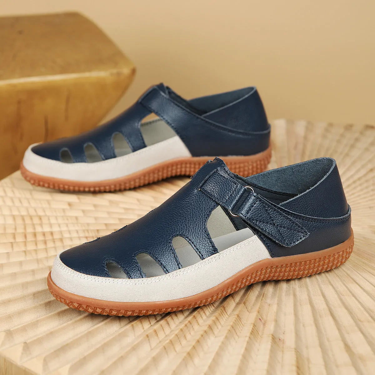 Plus size women's flat heel sandals with hollow toe cap design in blue colour