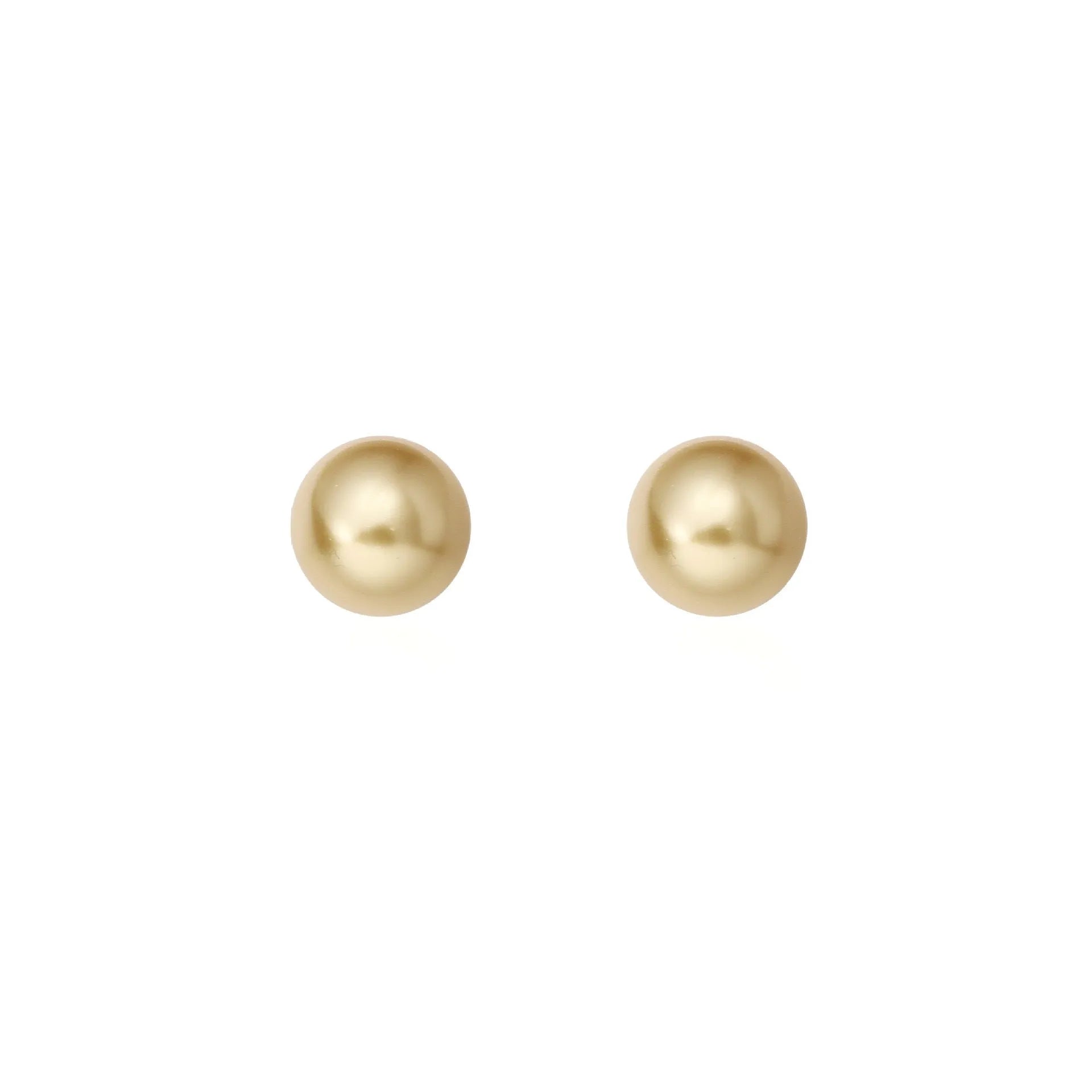 A pair of large geometric pearl stud earrings with an eight-point star detail on silver settings.