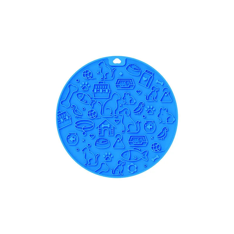 Round blue silicone pet licking mat with suction cup and textured surface for slow feeding.