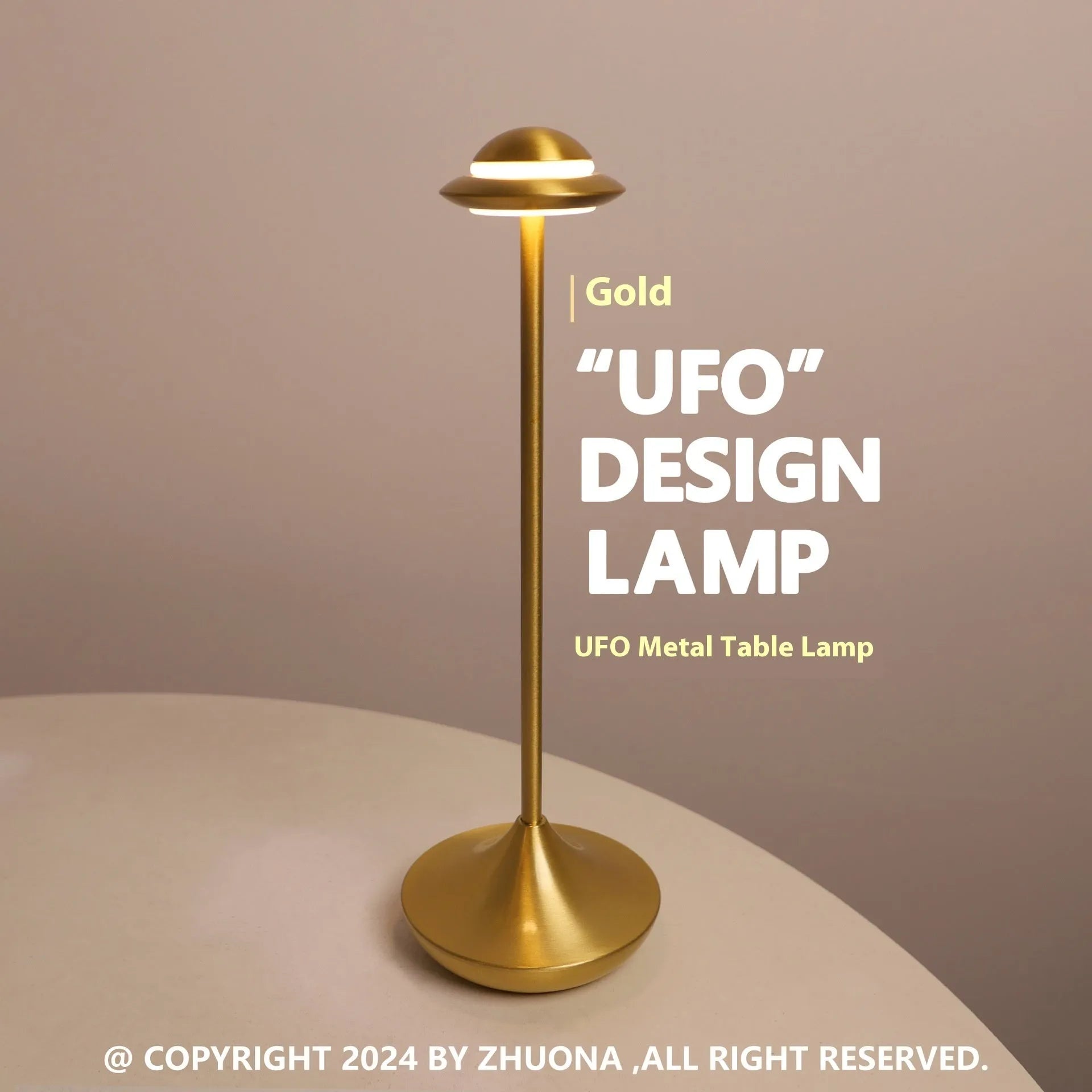 UFO-shaped table lamp with metallic finish and touch controls on desk surface