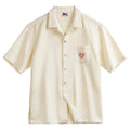 Men's light apricot Cuban collar shirt with bamboo and floral pattern detail