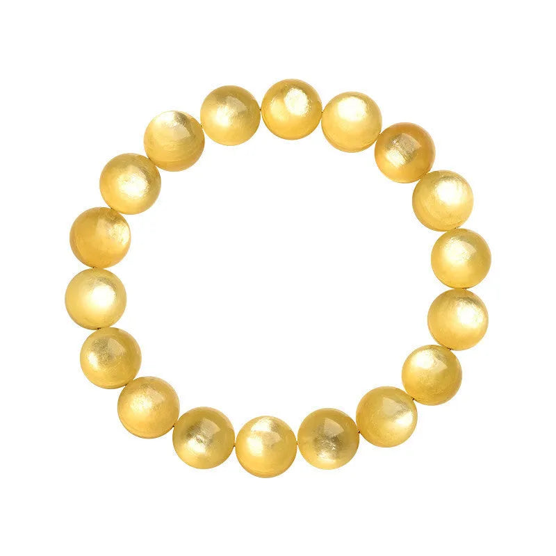 Yellow Lepidolite mica stone bead bracelet with round geometric design on wrist