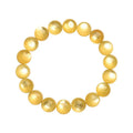 Yellow Lepidolite mica stone bead bracelet with round geometric design on wrist