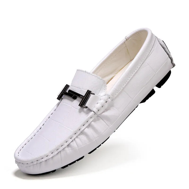 Men's black casual leather shoes with a belt buckle and flat rubber sole