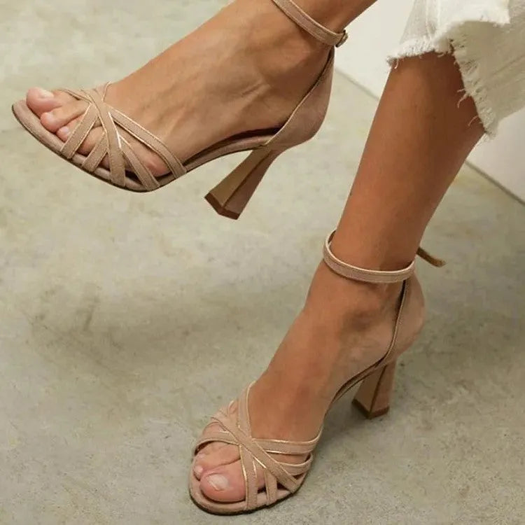 Apricot coloured women's suede high heel sandals with a fish mouth peep toe design.
