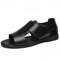 Men's black and brown leather open-toe casual sandals with rubber soles, shown from the side.