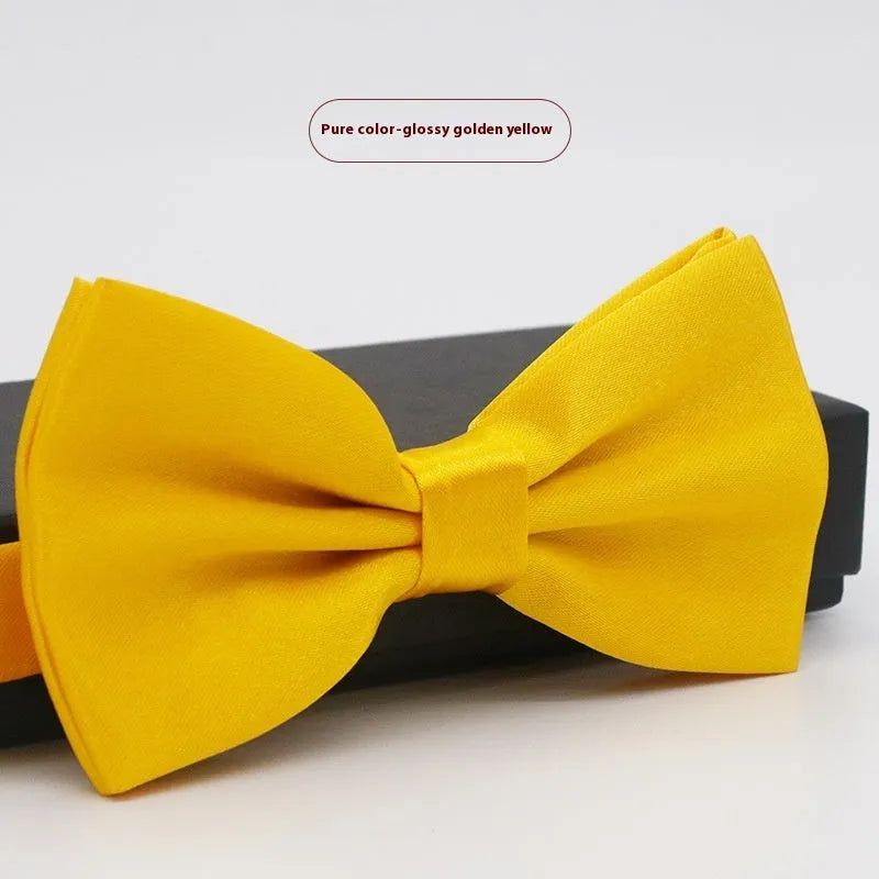 Men's flat head solid colour bow tie in polyester, showing 12cm by 6cm size on a background.