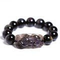 Polished icy obsidian crystal Pi Xiu bracelet with geometric beads in multiple sizes