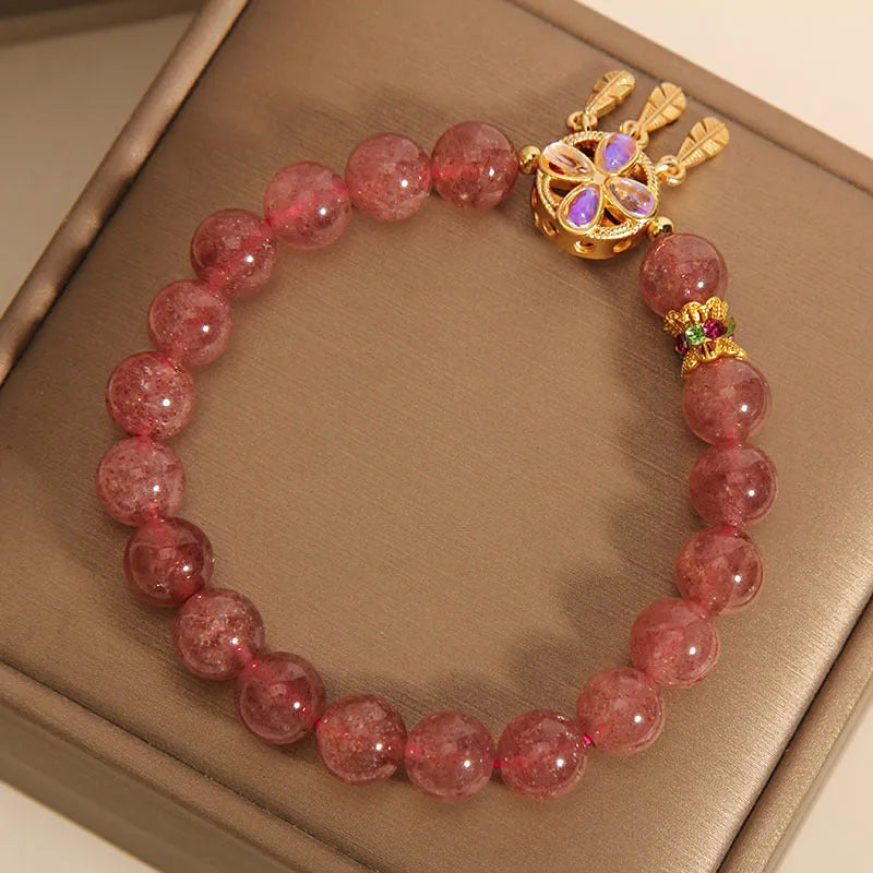 Women's strawberry quartz crystal bracelet with four-leaf clover dream catcher pendant