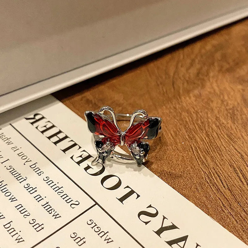 Women's copper butterfly ring with dripping oil finish and adjustable open loop design