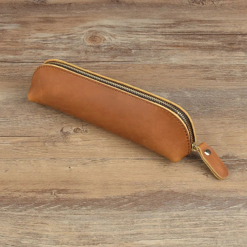 Square leather pencil case with zipper closure in black, brown, dark brown, or yellow colour