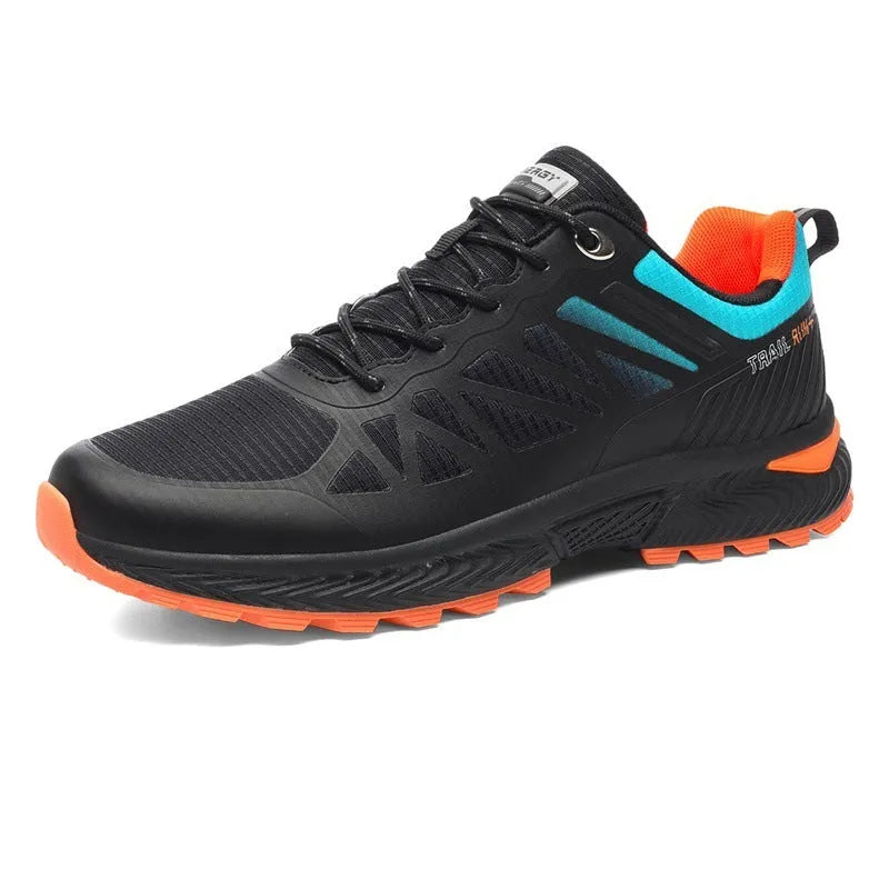 Men's black and orange mesh running shoe with lace-up front and rubber sole.