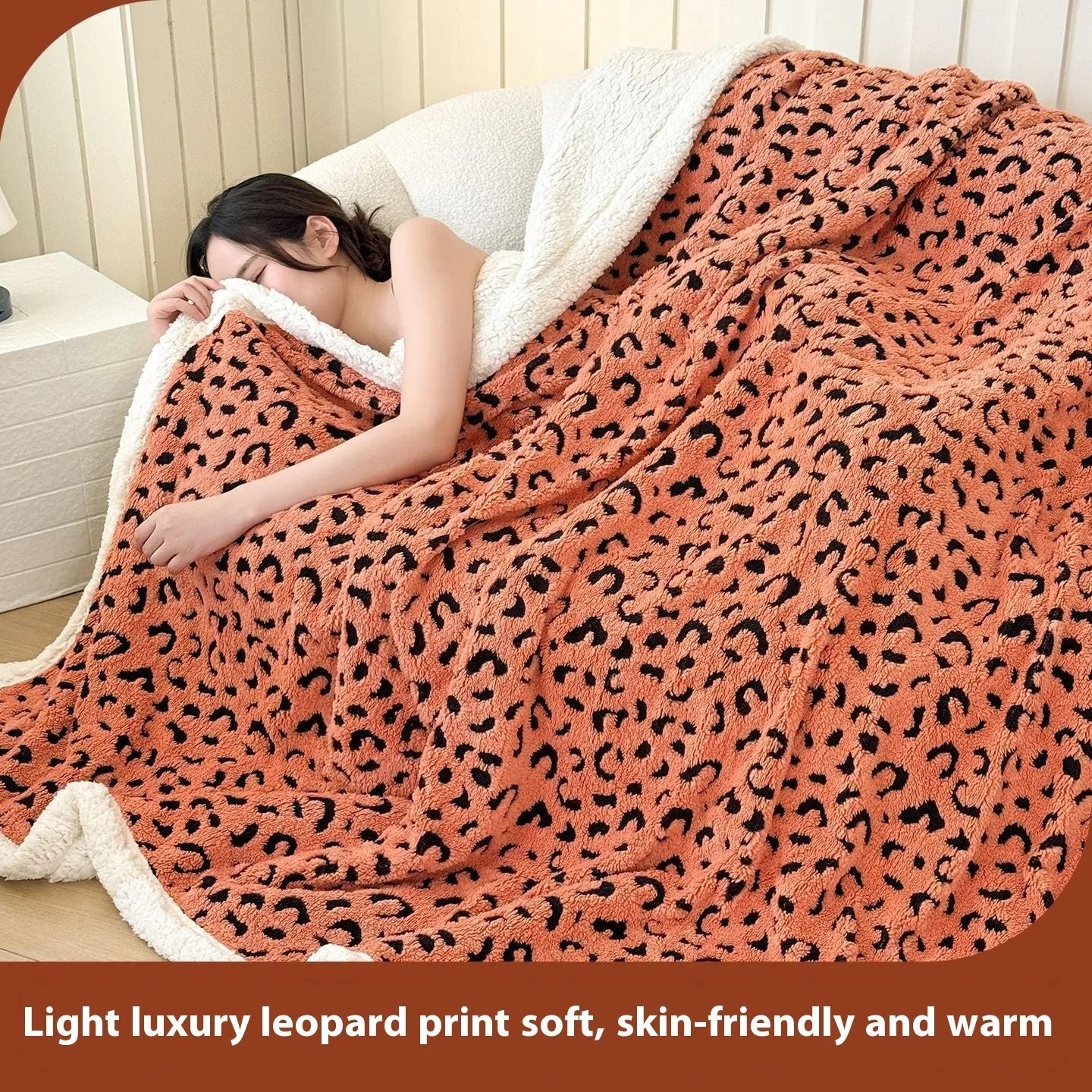 Double-layer cationic leopard jacquard taffeta blanket showing leopard print pattern in camel colour.