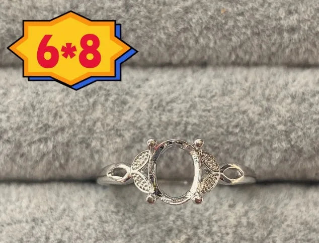 Copper oval denier ring with a 6x8 mm five-pointed star and open mouth setting.
