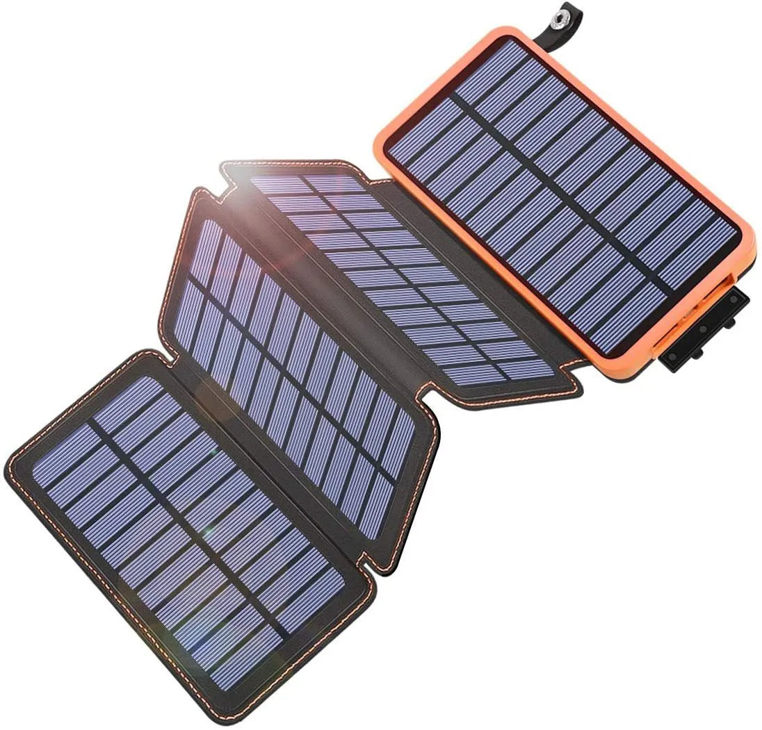 Black solar power bank with a solar panel, LED light, USB ports, and a soft leather casing.