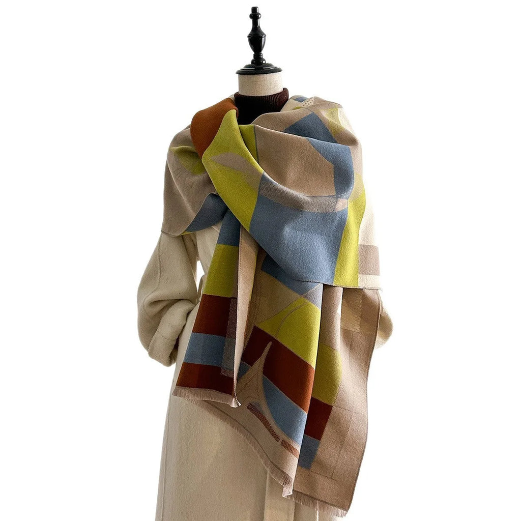 Long beige imitation cashmere scarf draped to show its 185cm length and texture.