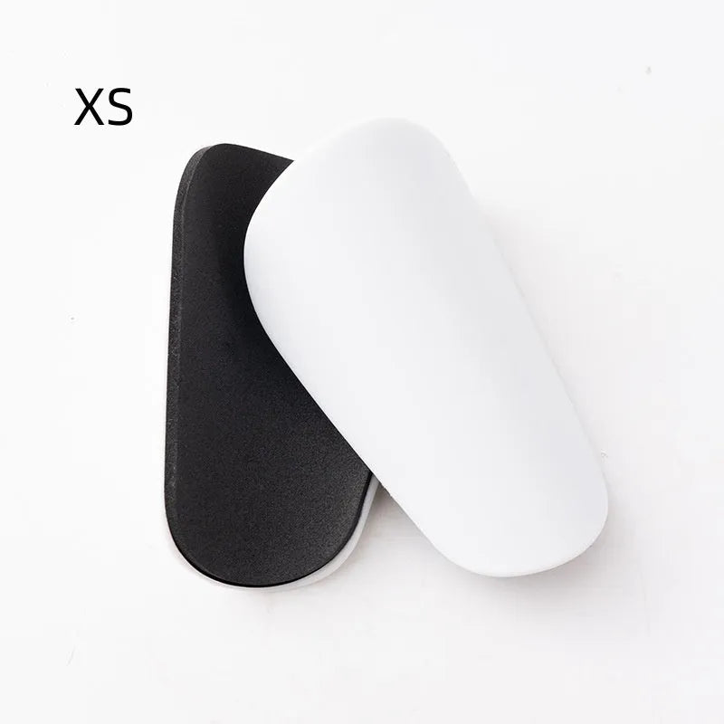 PU mini shin guards for football and sports in black, white, red, and blue colours.