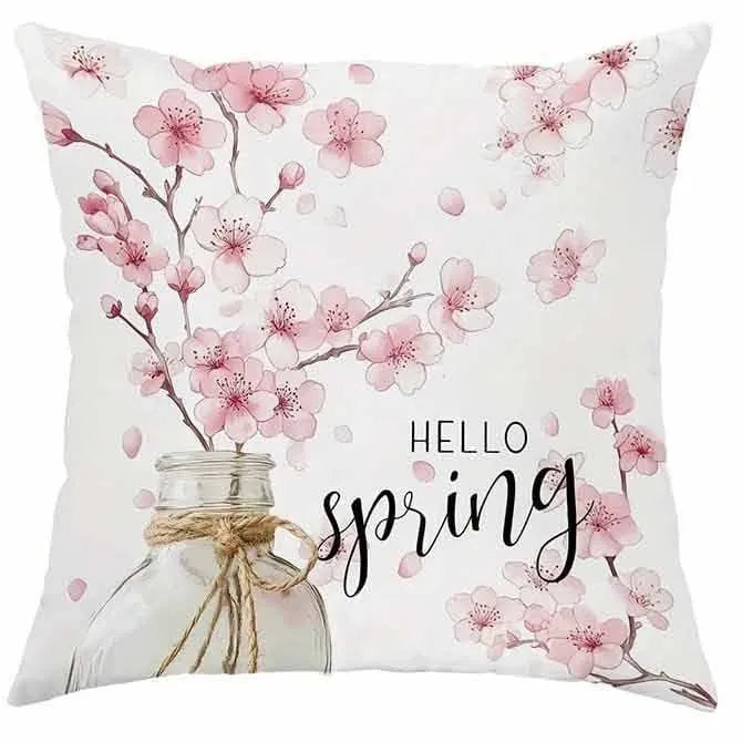 Square cherry blossom letter patterned cushion cover on a sofa, short velvet fabric.