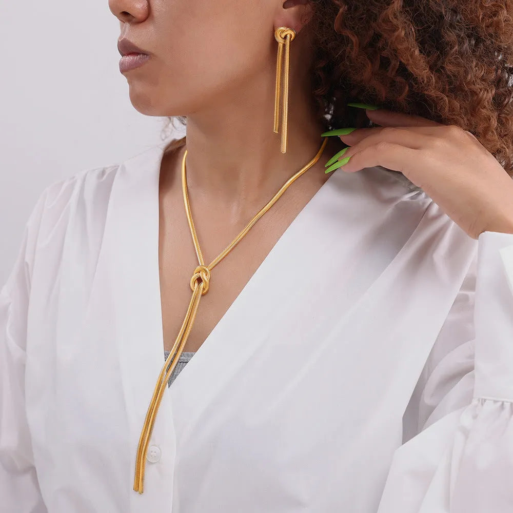 Gold electroplated titanium steel knotted tassel snake chain necklace with matching earrings set