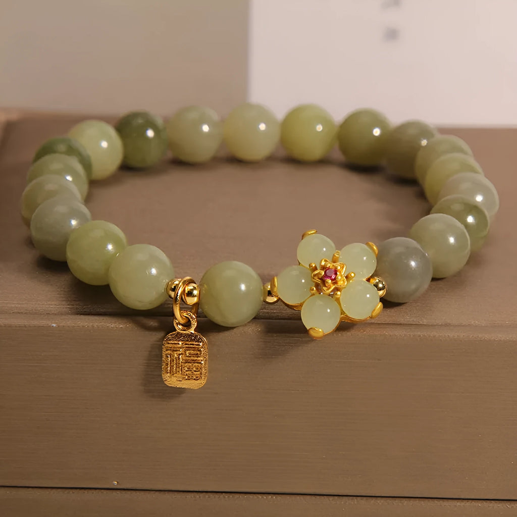 Women's casual alloy bracelet with grey jade stone accent on wrist