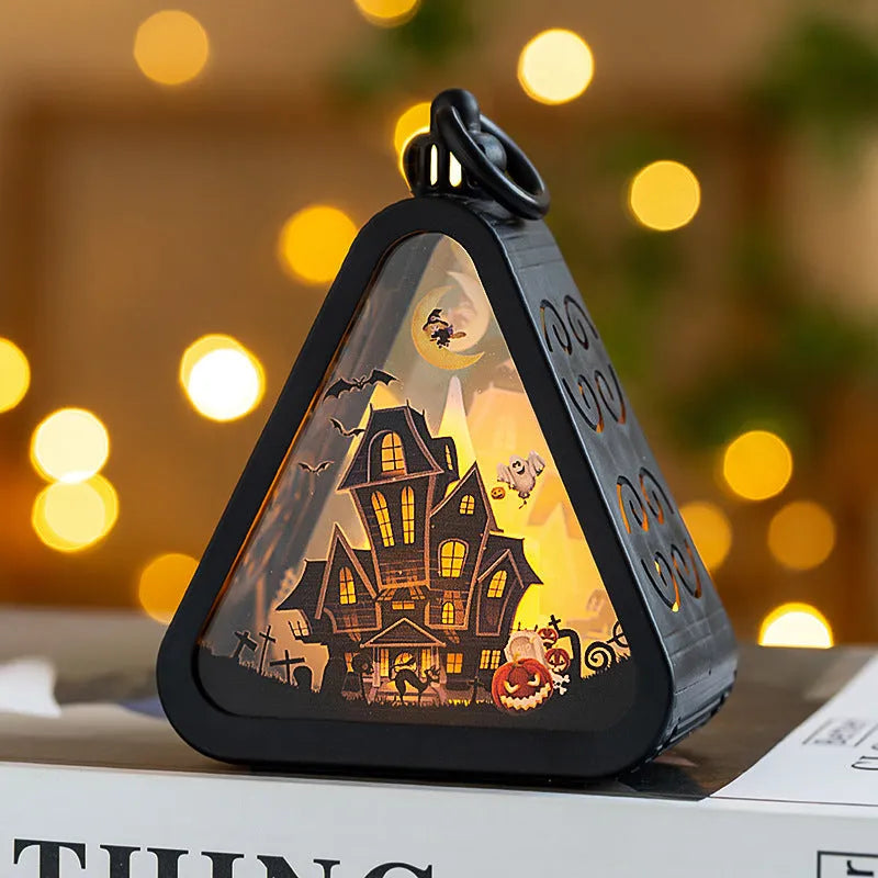 Portable Halloween pumpkin lamp decoration in plastic and glass with four colour theme options