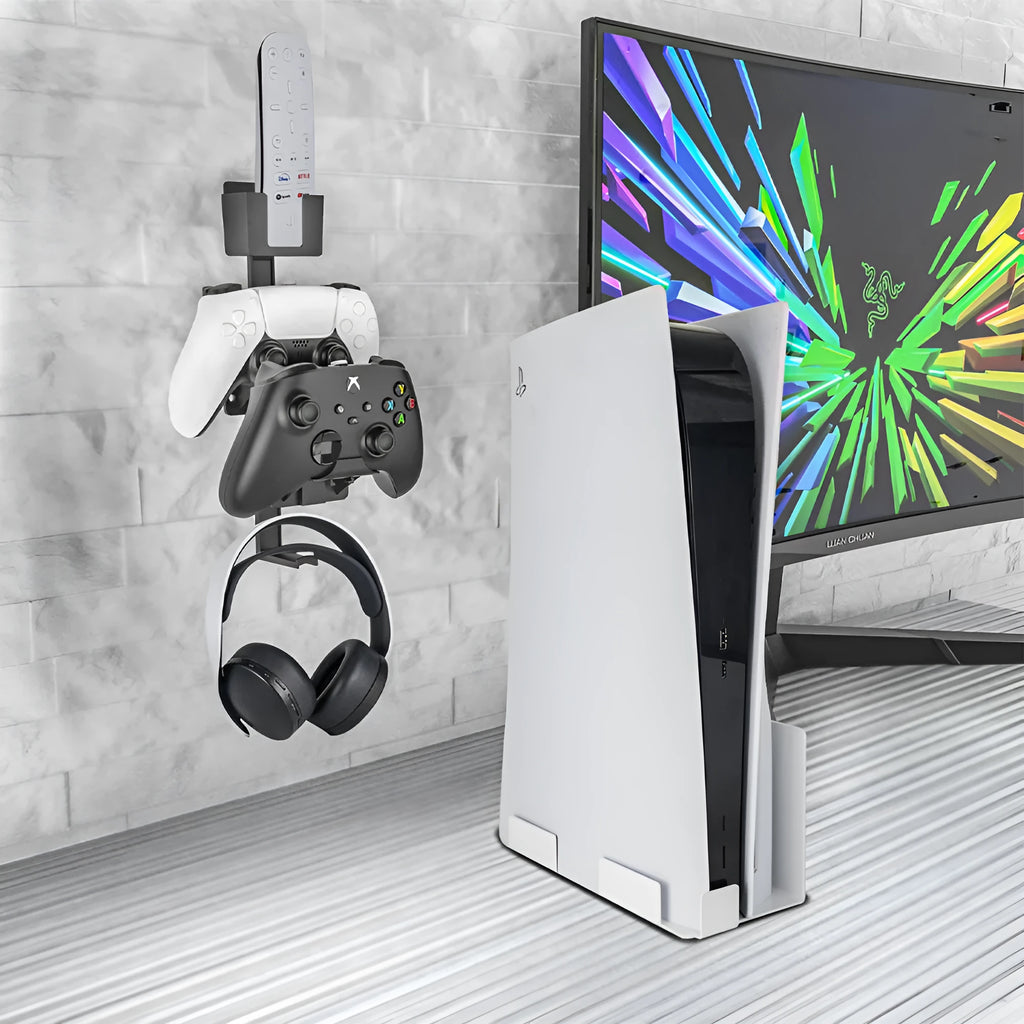 White self-adhesive wall hook holding a black gaming controller and headset.