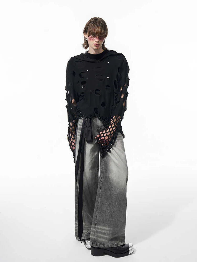 Black men's loose fit hoodie with pearl decorations on the hood, showing thin hollow knit construction.