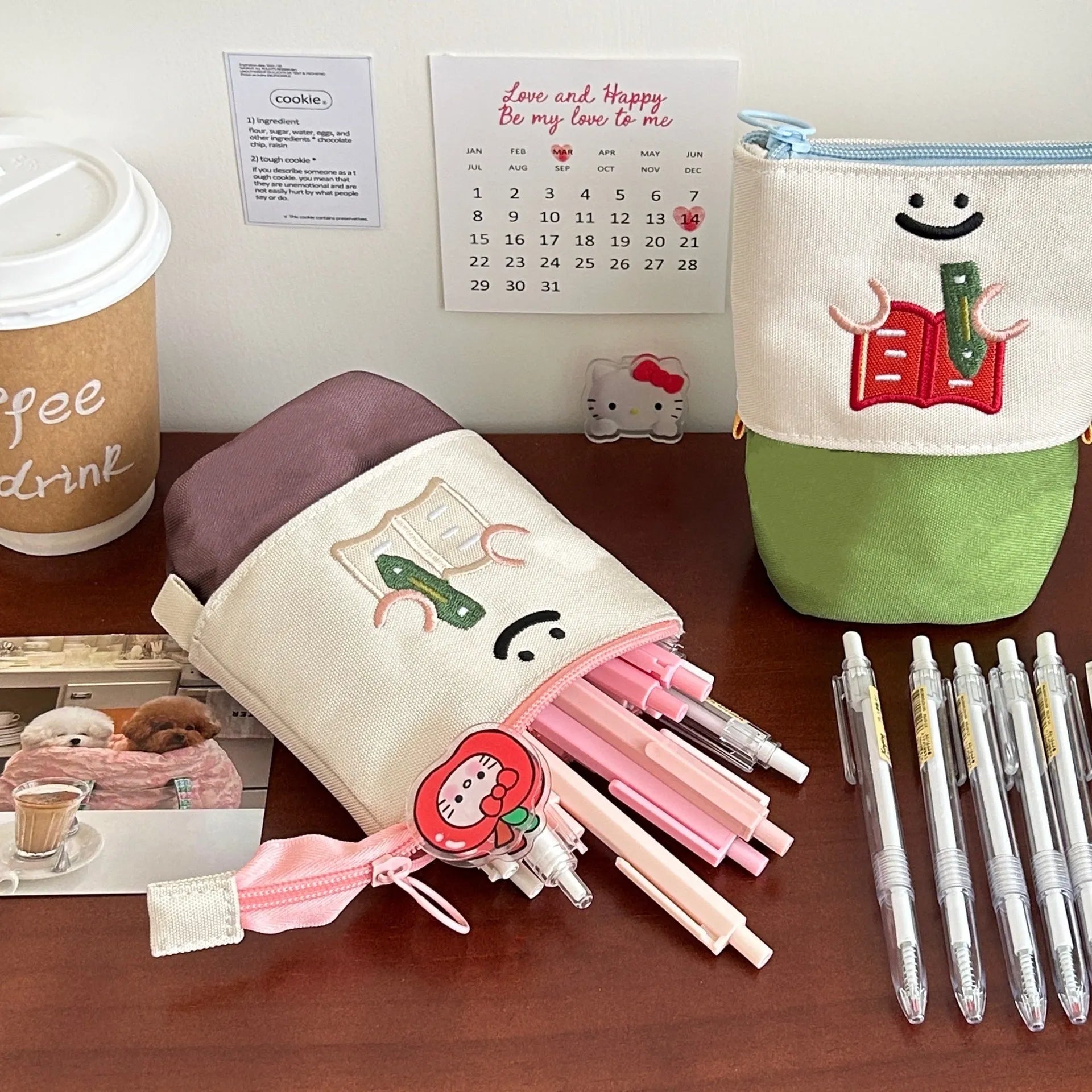 Brown Korean-style cartoon collapsible pencil case made from Oxford fabric, shown open.
