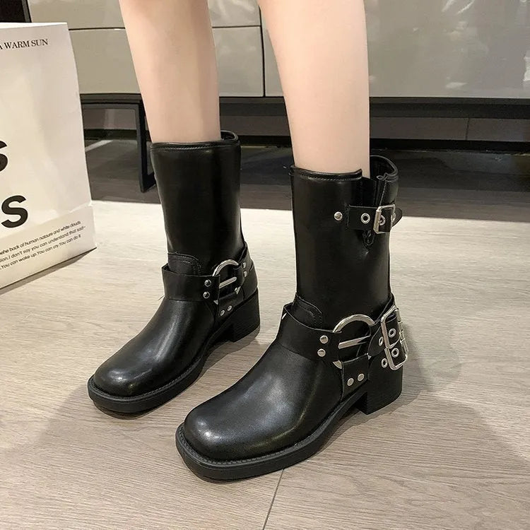 Women's platform boots with belt buckle detail at mid-calf length