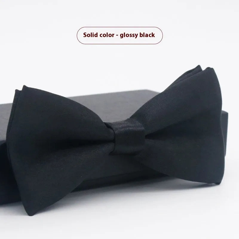 Men's flat head solid colour bow tie in polyester, showing 12cm by 6cm size on a background.