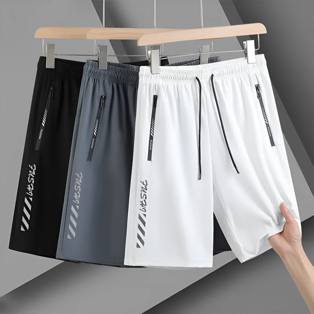 Men's black quick-dry loose fit sports shorts with elastic waistband on size chart