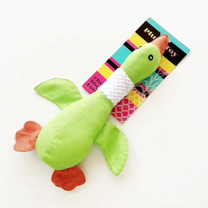 Blue duck-shaped plush dog toy with squeakers for chewing and play