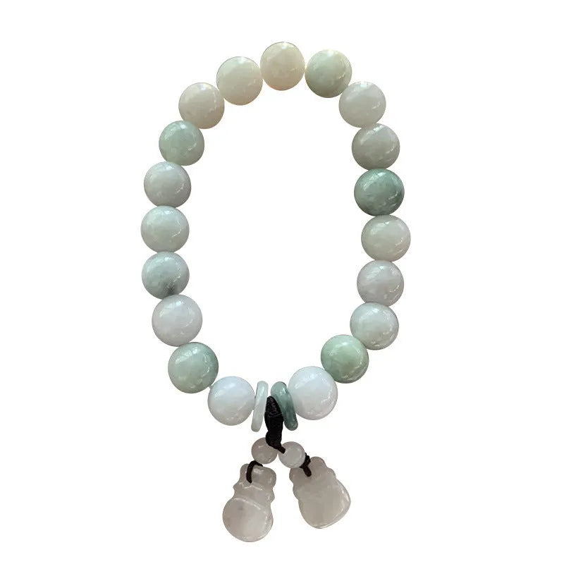 Natural green jade bracelet with hanging geometric charms including an Apple and a Maitreya Buddha pendant.