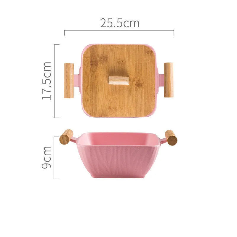 Porcelain ceramic bowl with irregular shape and matching lid in modern design