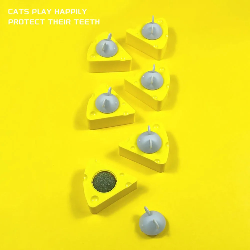 Yellow catnip toy balls for feline dental care and entertainment