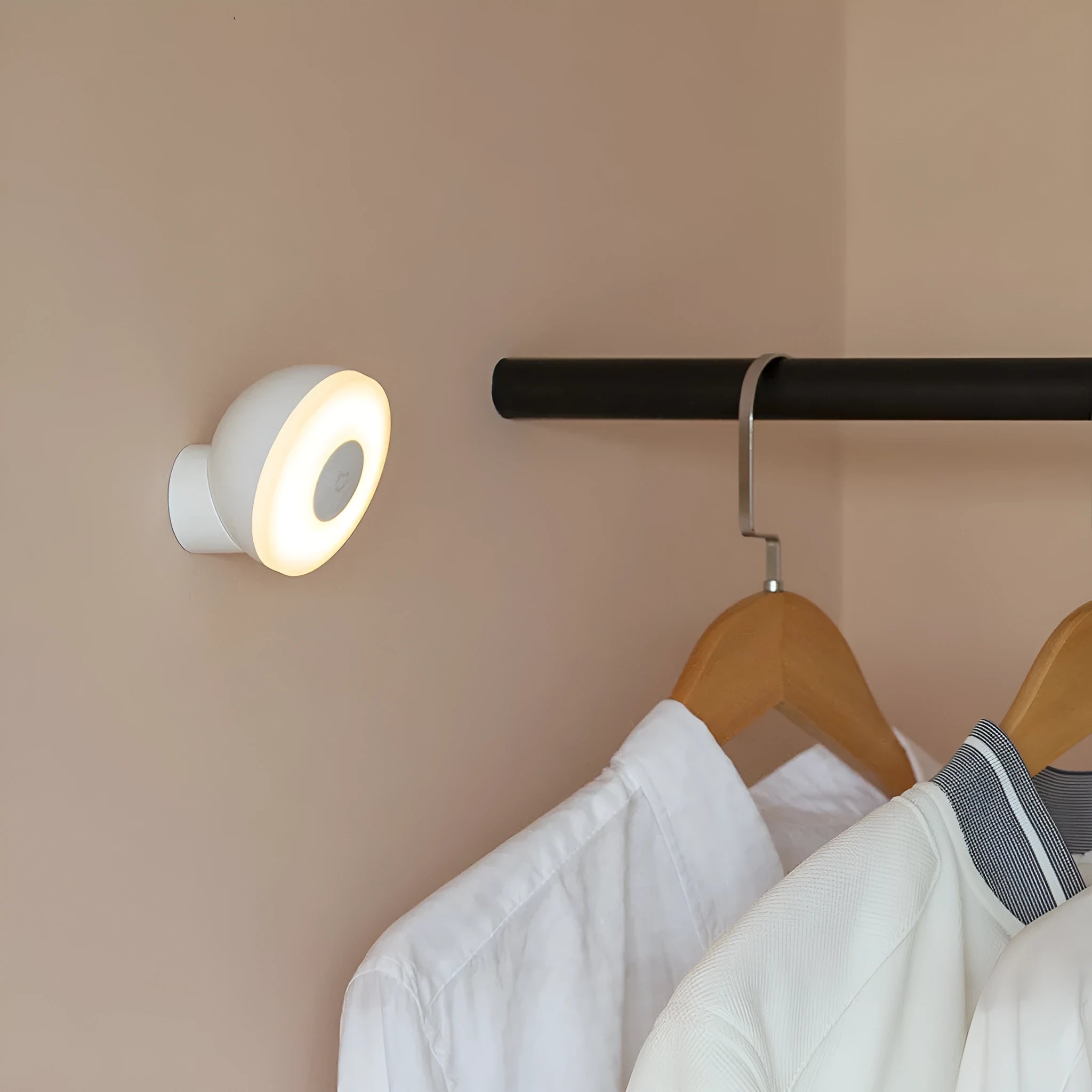 White Mijia Bluetooth bedside night light with human body induction on a wooden table.