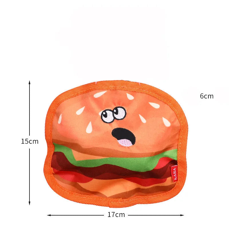 Hamburger-shaped dog chew toy in vivid colours showing crinkle and squeak features for interactive play.