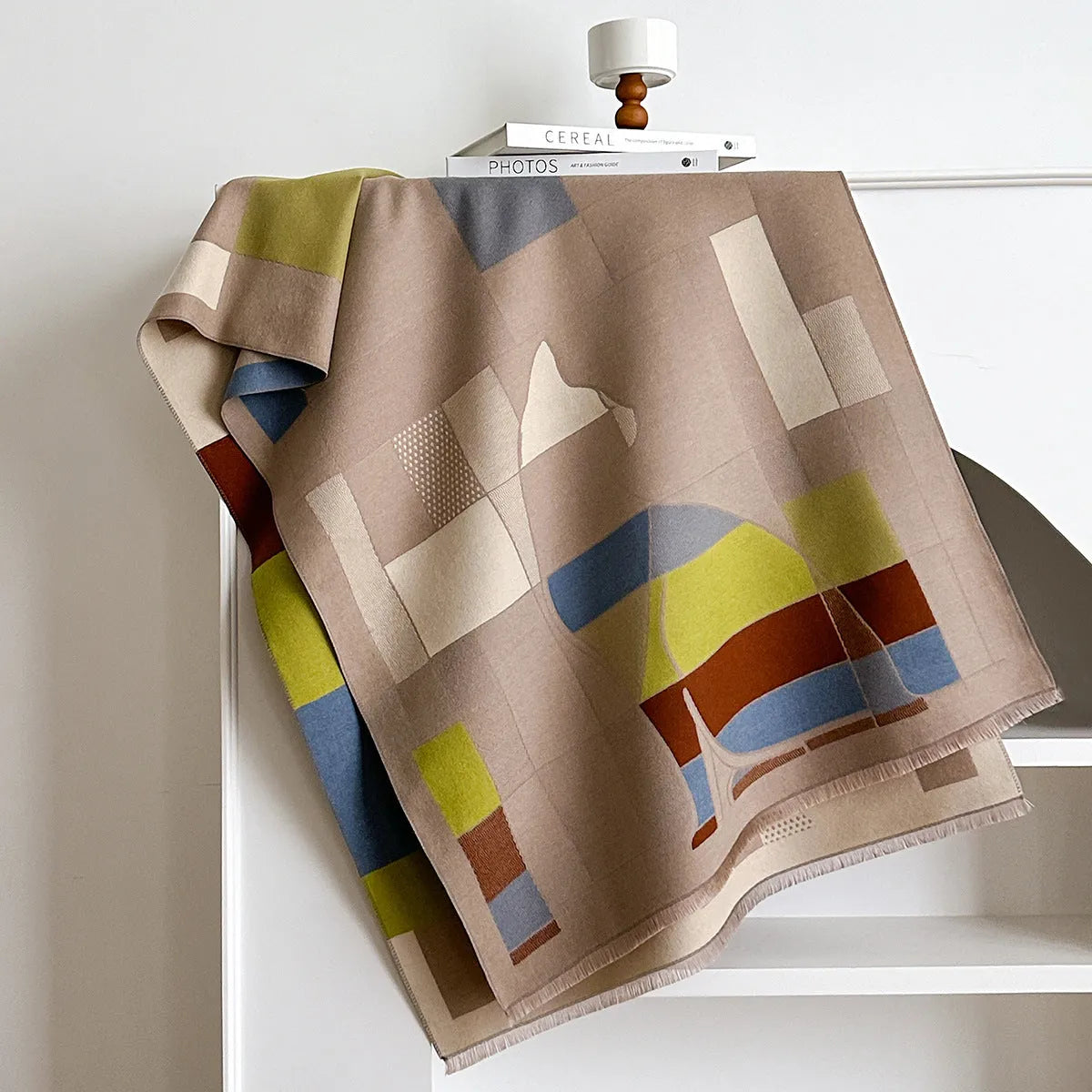 Long beige imitation cashmere scarf draped to show its 185cm length and texture.