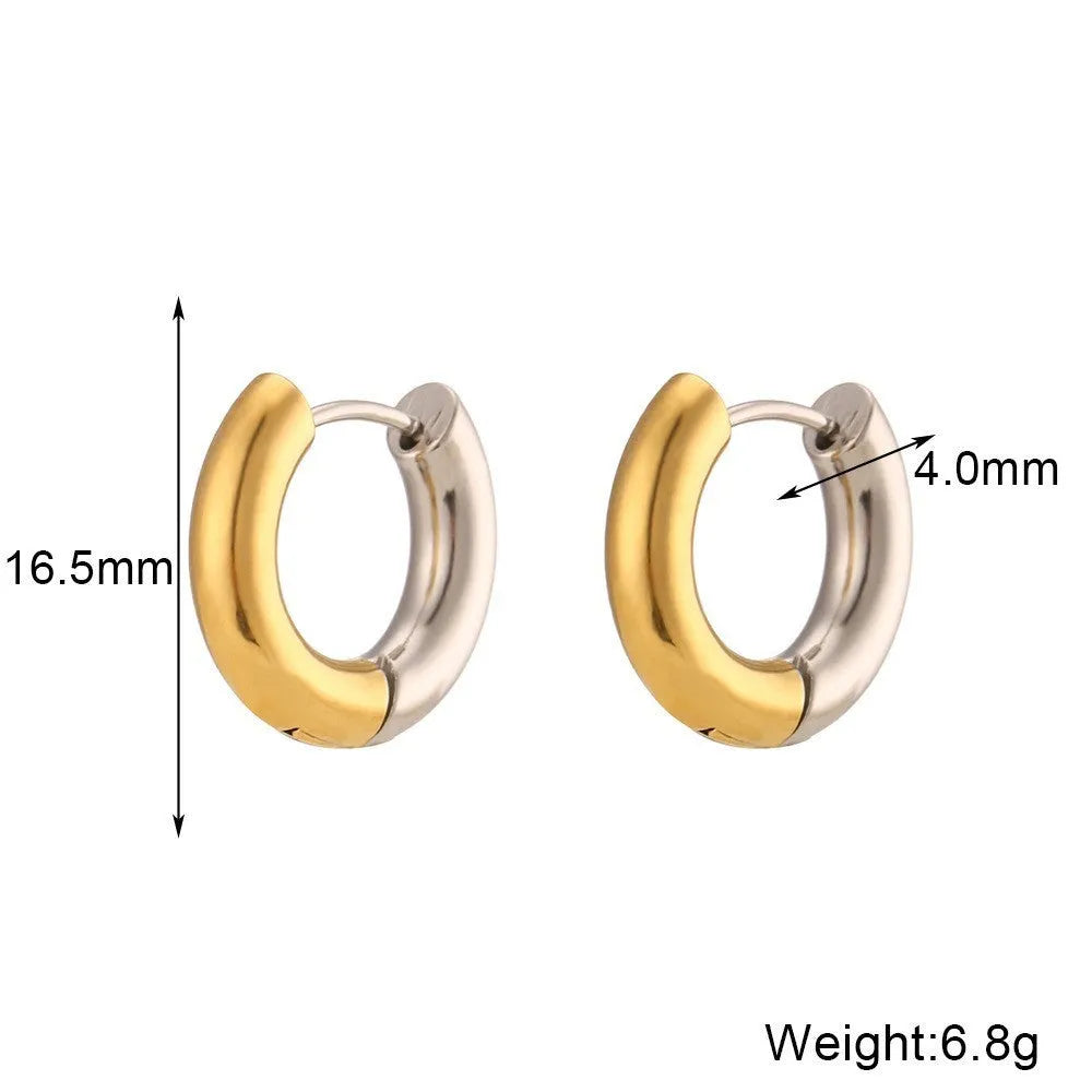 Gold tone geometric jewellery set including earrings, bracelet and necklace with round ring design elements