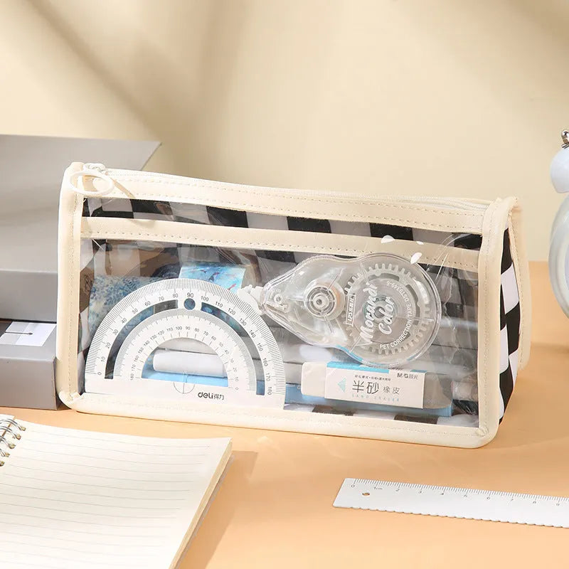 Large transparent PVC pencil case with a chessboard pattern, showing pens inside.