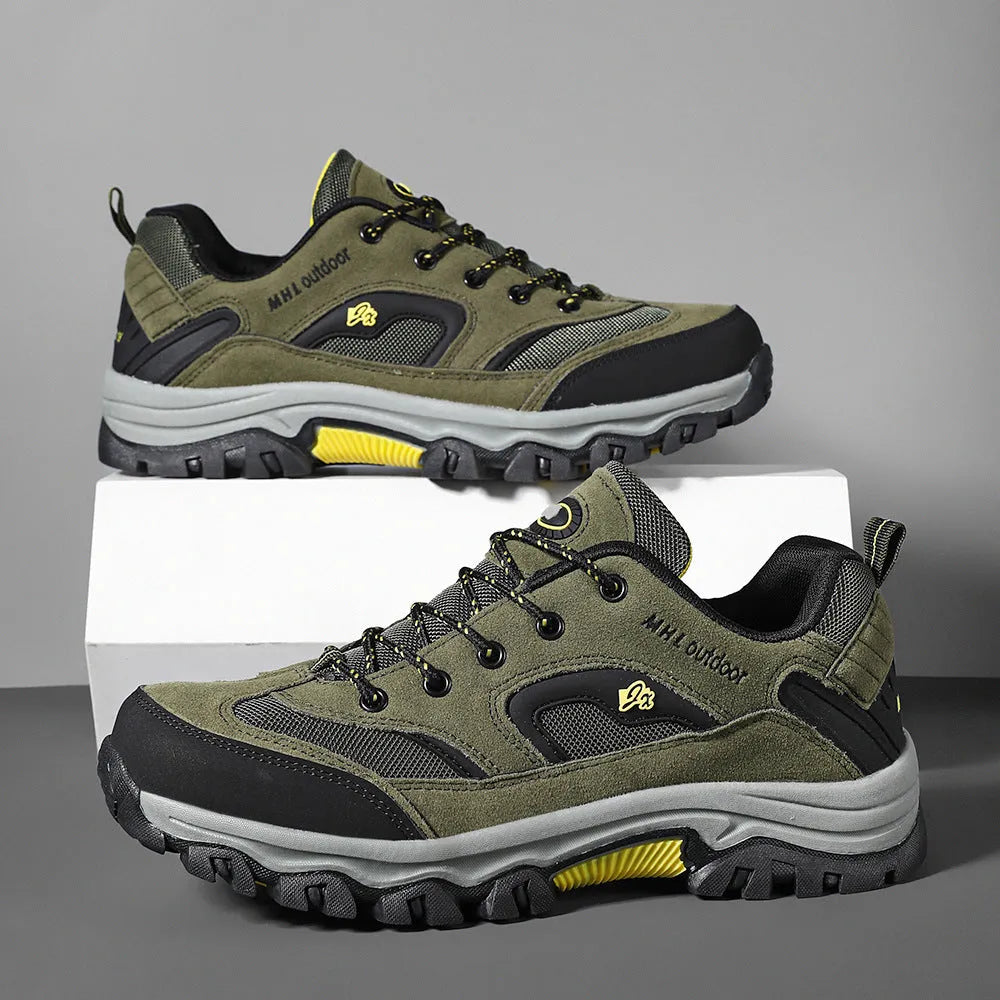 Men's waterproof non-slip mountain climbing sneakers soft bottom in army green on rocky trail