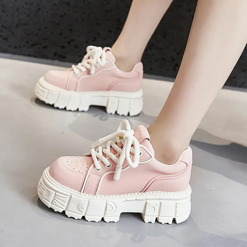 Women's beige leather casual shoes with subtle platform muffin bottom sole design