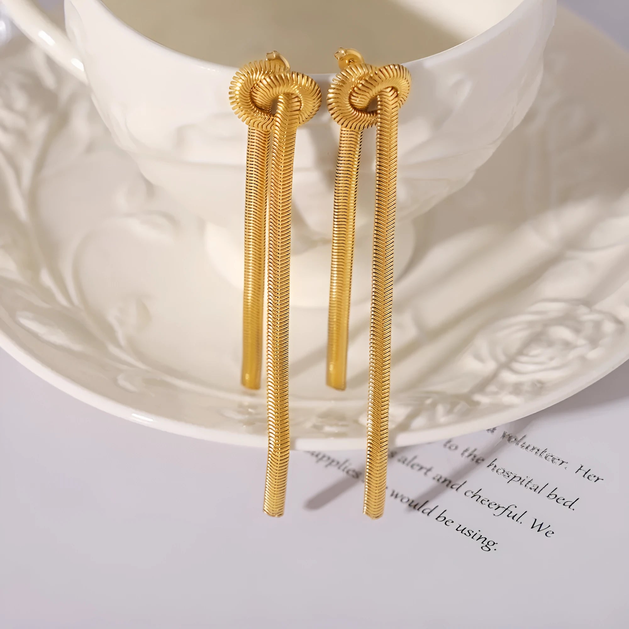 Gold electroplated titanium steel knotted tassel snake chain necklace with matching earrings set