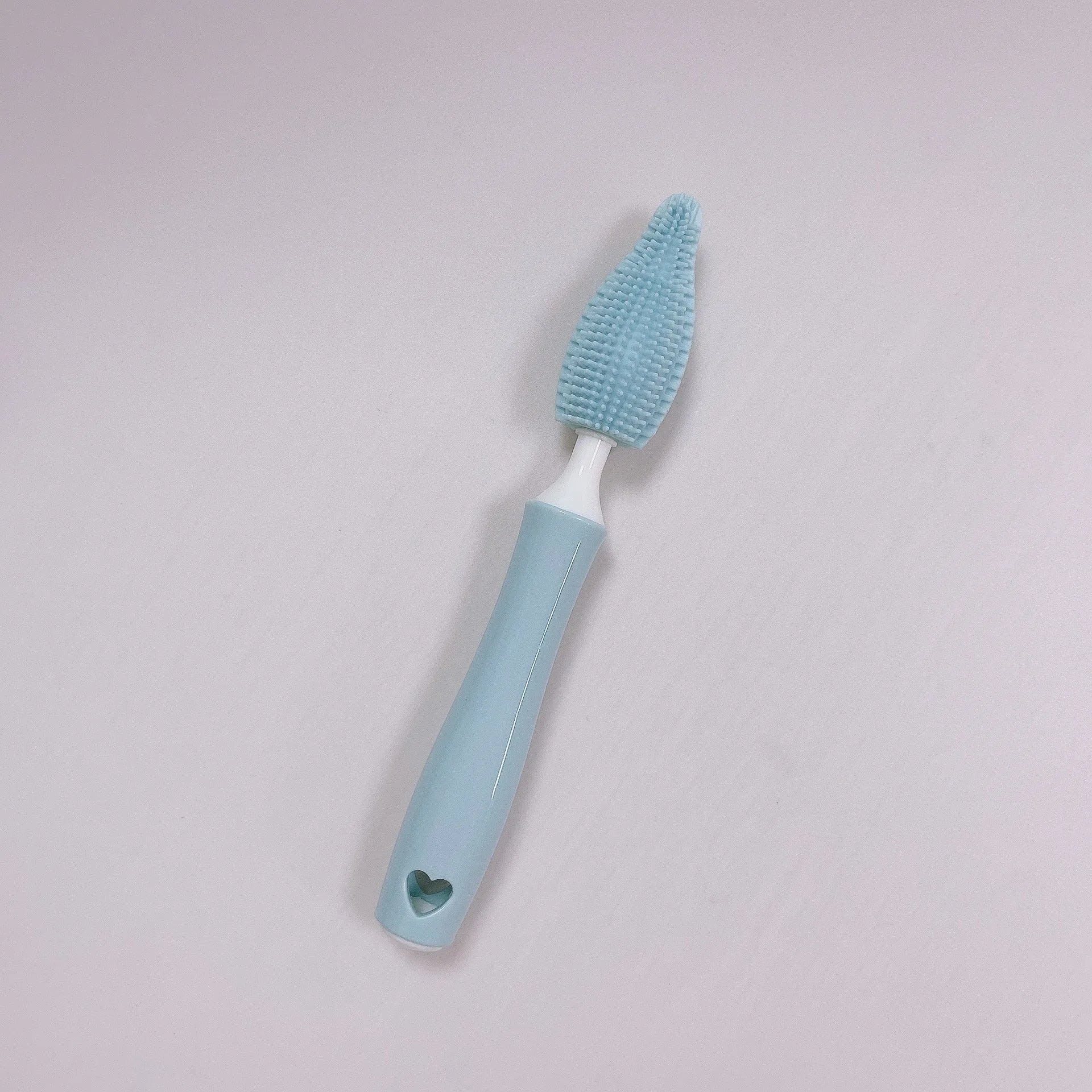 Silicone baby bottle brush and straw cleaning tool set in assorted colours.